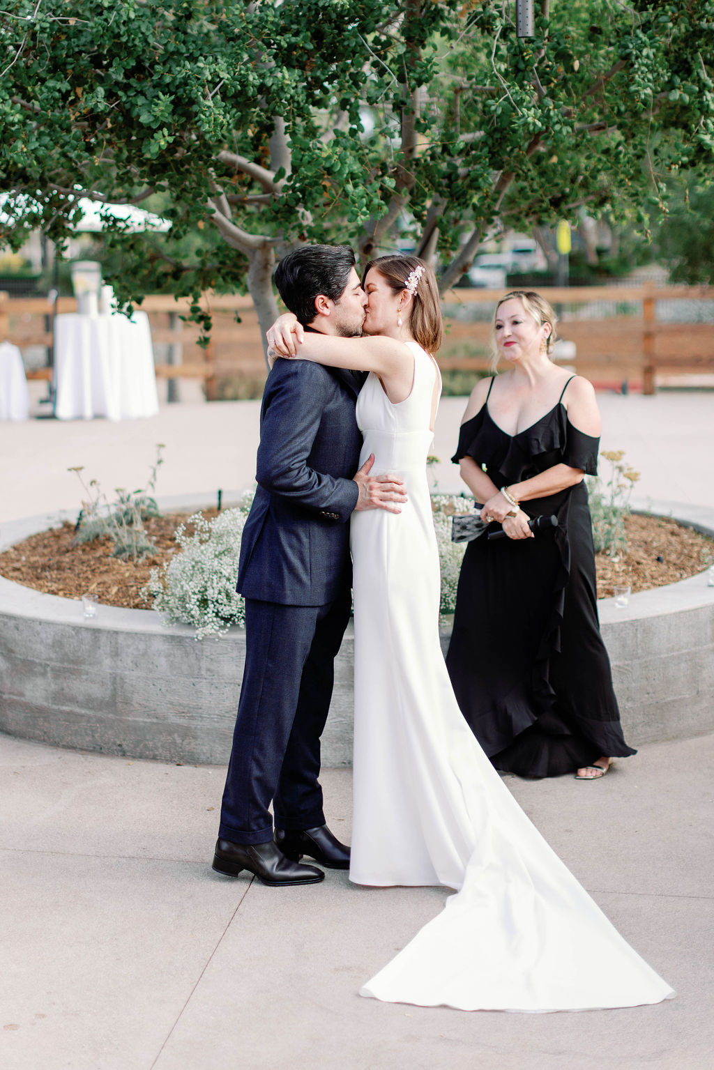 Wedding kiss photo at Aliso Viejo Ranch by Sarah Block Photography