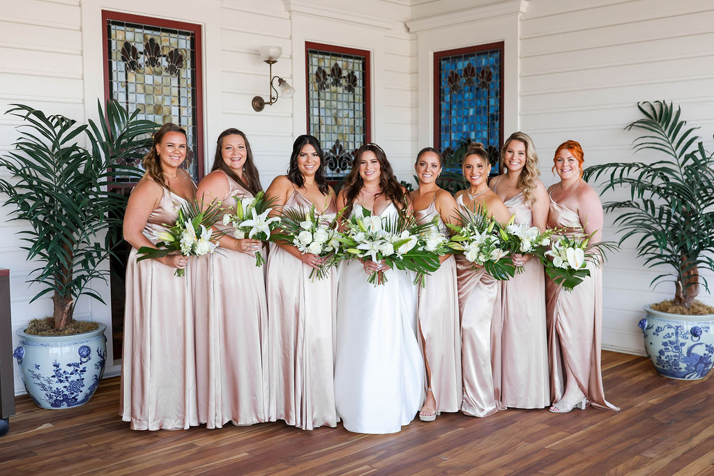 Bride and her bridal party after getting in their gowns at the Hotel Del Coronado in San Diego. Photo by Sarah Block Photography.