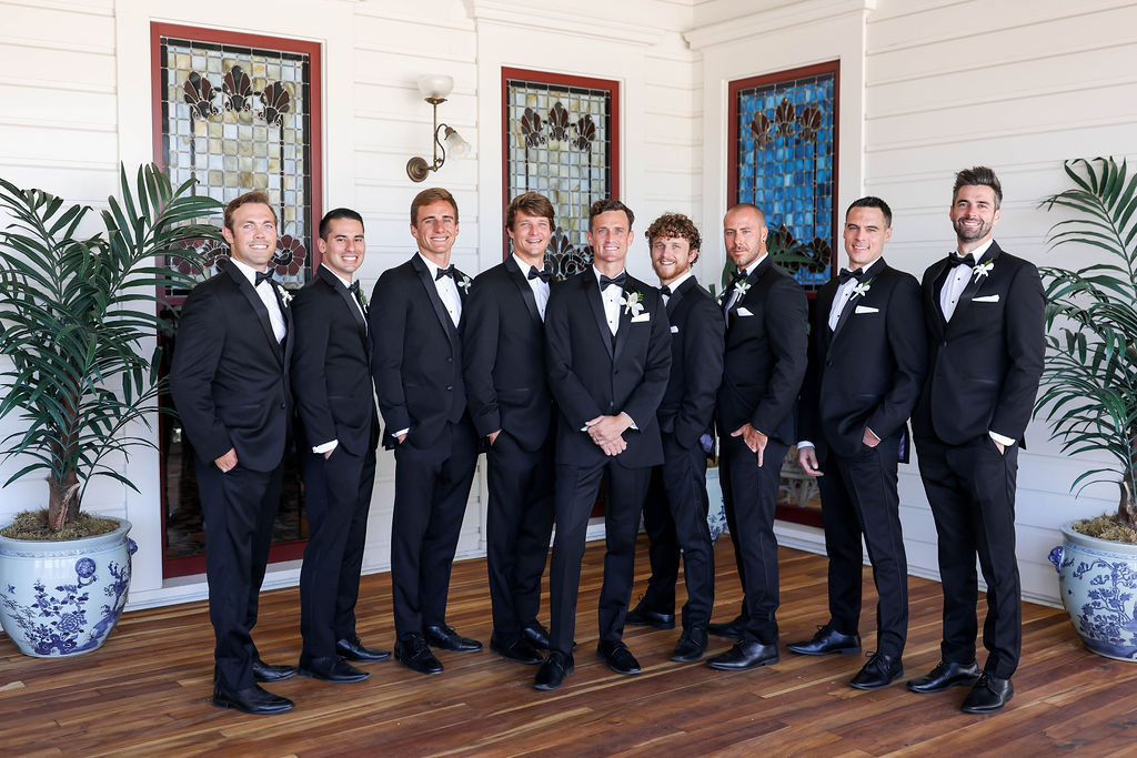 The Groom and his groomsmen standing at the Hotel Del Coronado before the wedding. Photo by Sarah Block Photography.