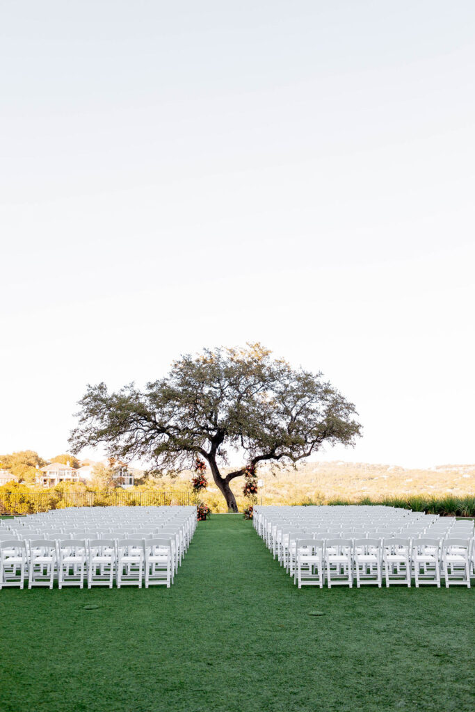 Magnificent tree as the backdrop for the wedding ceremony onsite at the Omni Barton Creek Resort in Austin Texas. | | Photo by Texas Photographer Sarah Block Photography