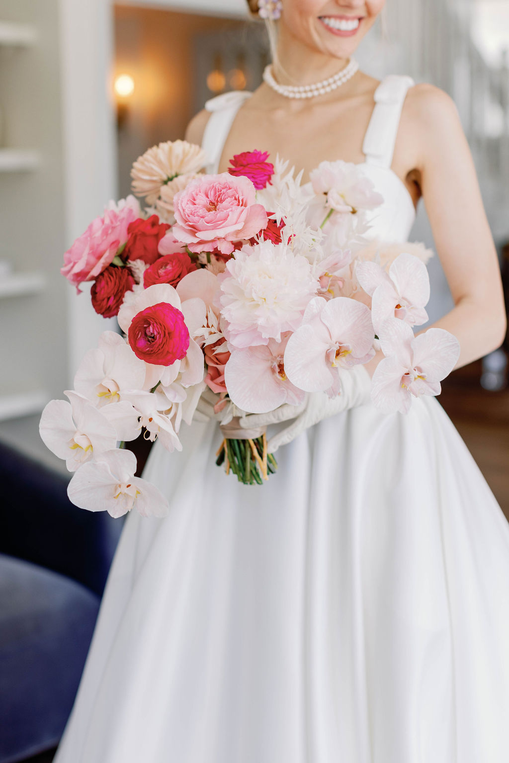 Close up of the bride's full wedding bouquet in shades of pink flowers at the Grand Lady wedding venue in Austin Texas. |Photographer Sarah Block of Sarah Block Photography