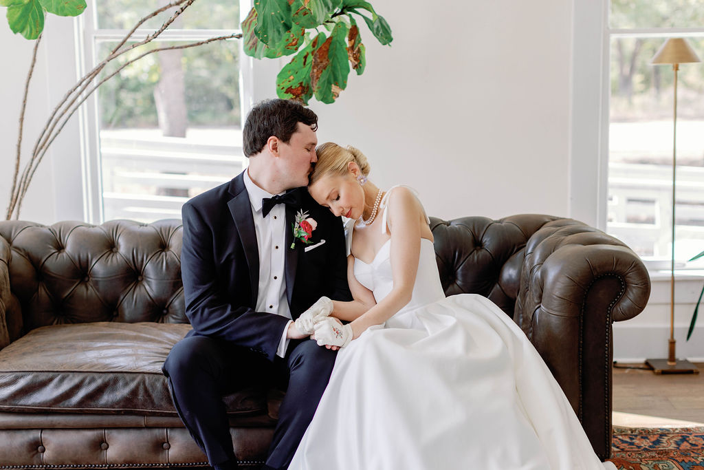 Bride and groom steal away and enjoy the embrace at the Grand Lady wedding venue in Austin Texas. | Photo by Sarah Block Photography