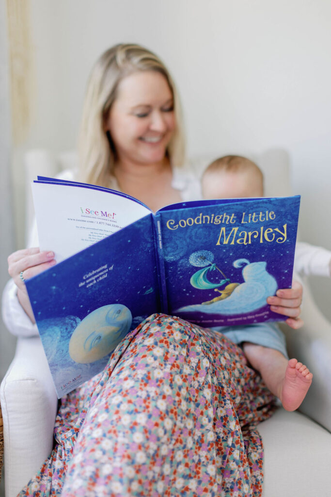 Michelle reads "Goodnight Little Marley" to her son sitting on her lap. Photo by Sarah of Sarah Block Photography